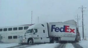 Train Crashes Into Fed Ex Truck… Watch The Video Here
